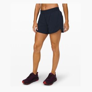 Navy Lululemon track that 5” shorts